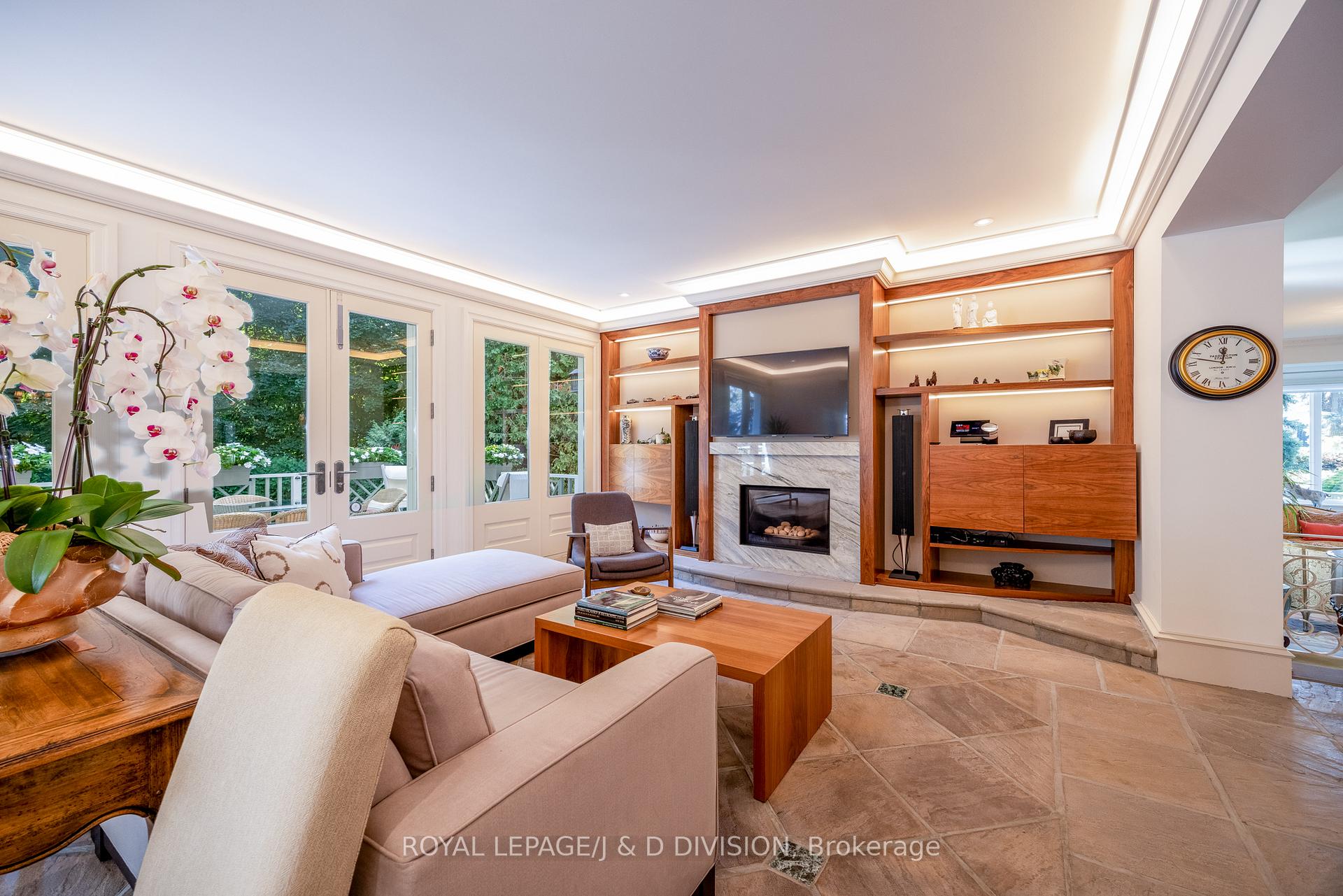 CONTEMPORARY FAMILY ROOM WITH WALNUT FINISHES