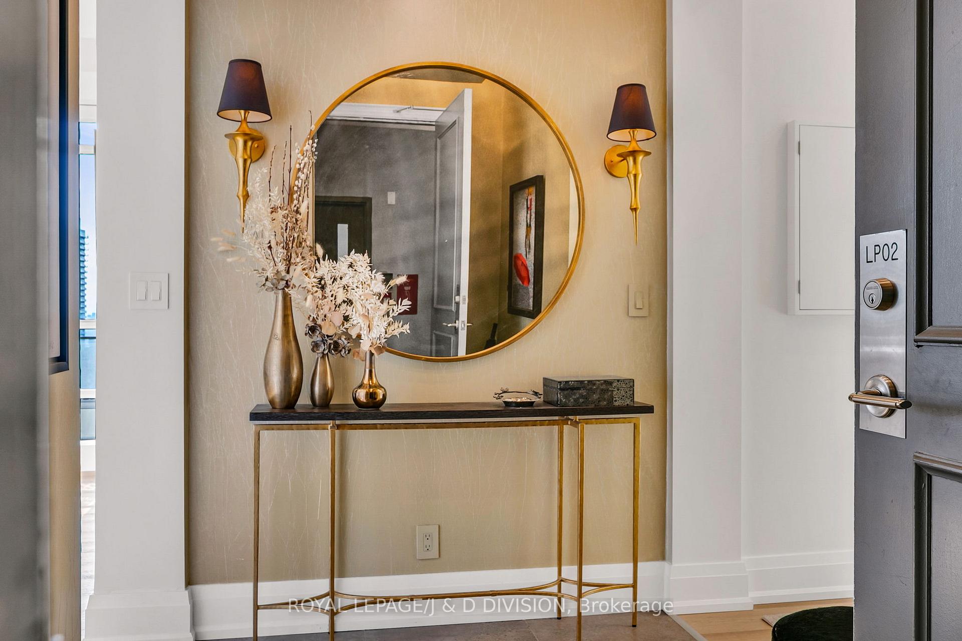 Textured wallpaper clad Foyer