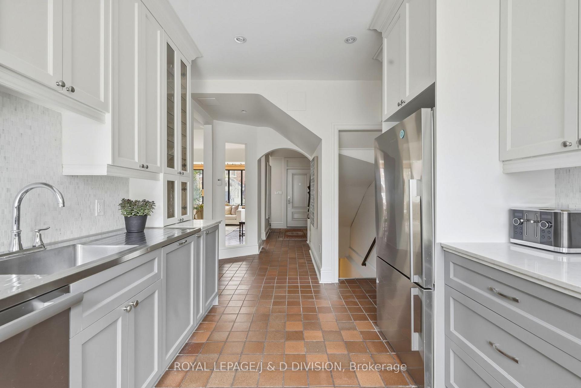 Beautiful stainless steel countertop by sink