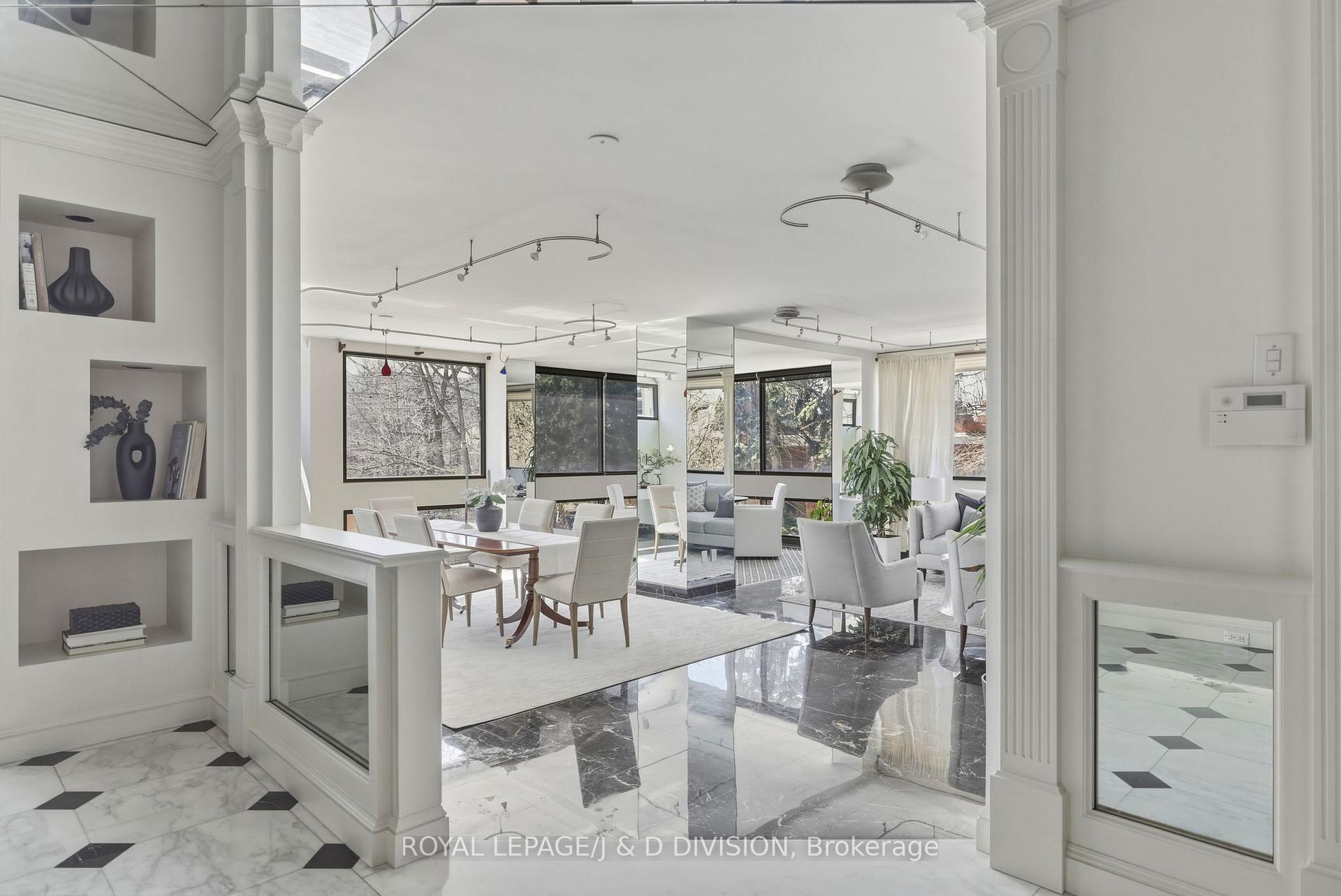 Welcoming Foyer overlooking sunken living / dining