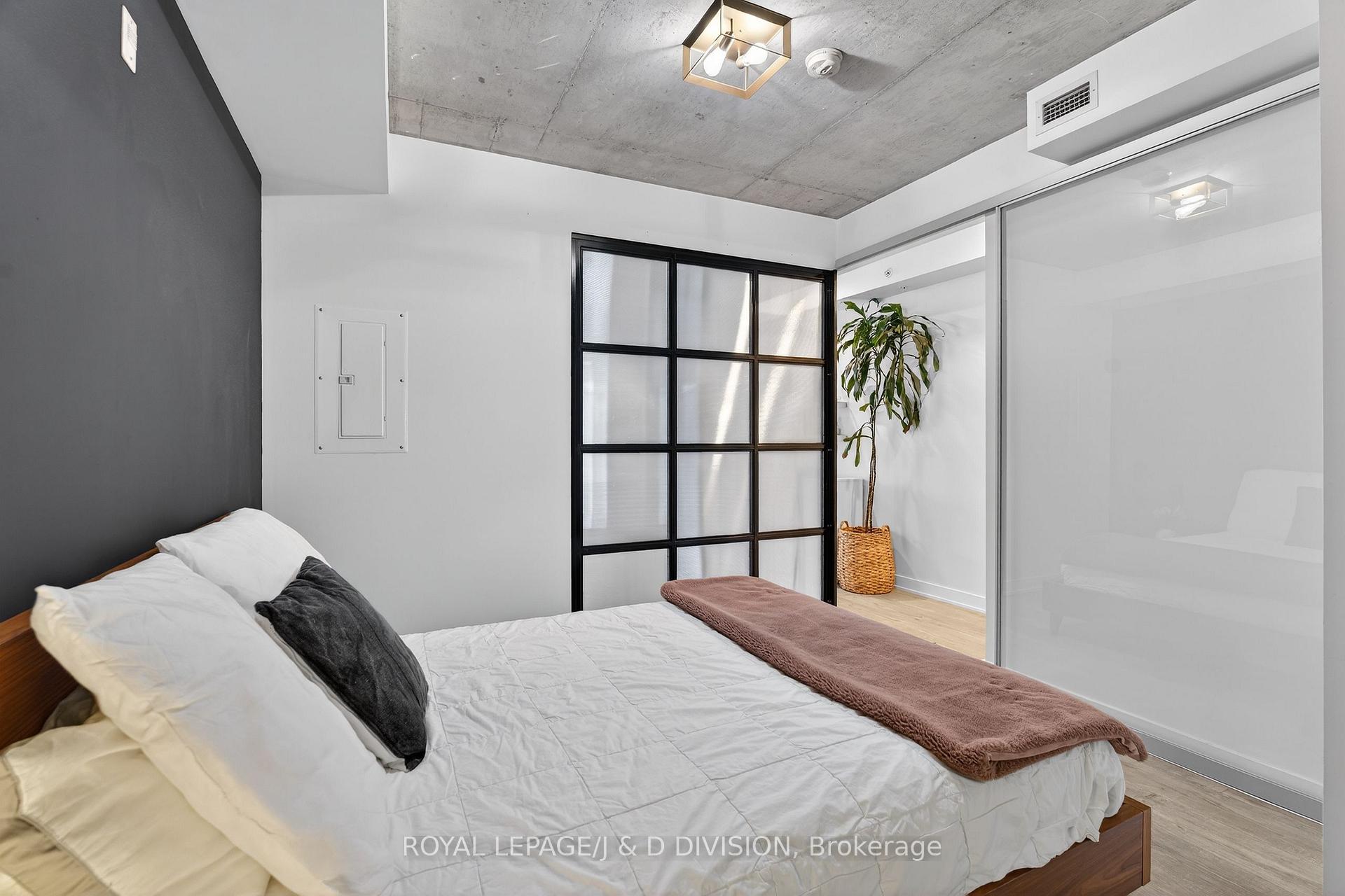 Bedroom with Custom glass wall