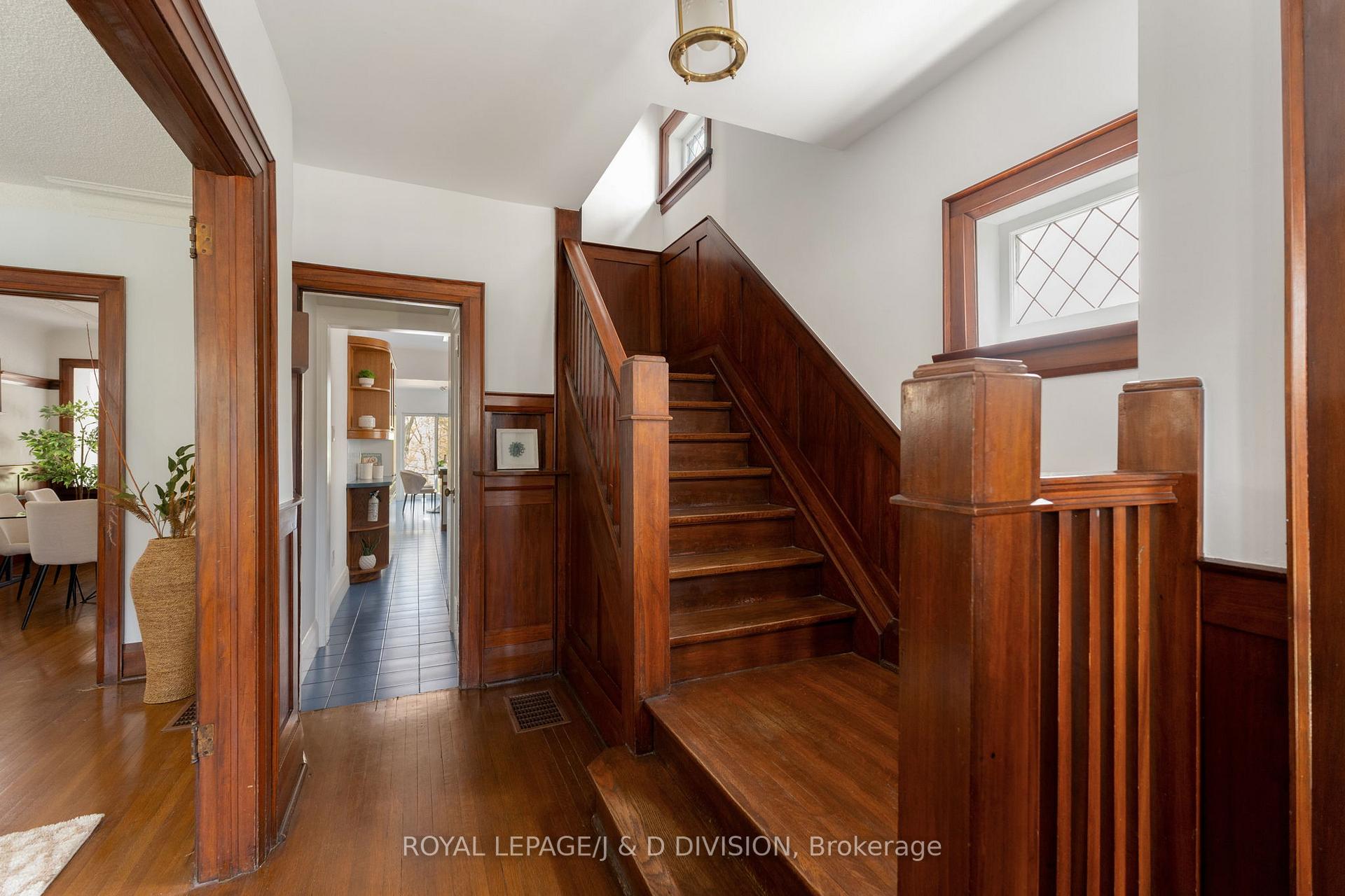 Stairs to upper level, Hallway to kitchen / living