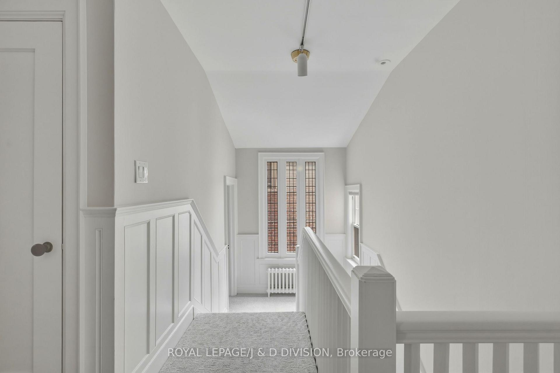 Stairs to second floor and landing to Bedroom 2