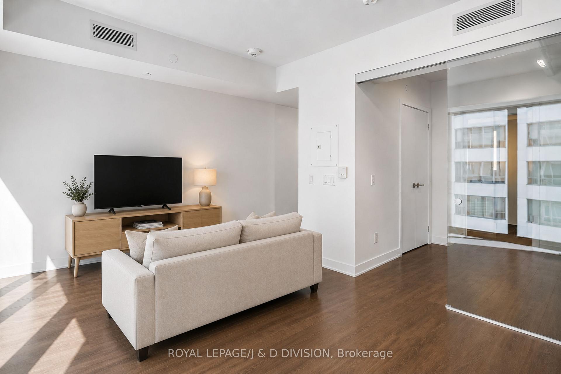 virtually staged with couch & TV
