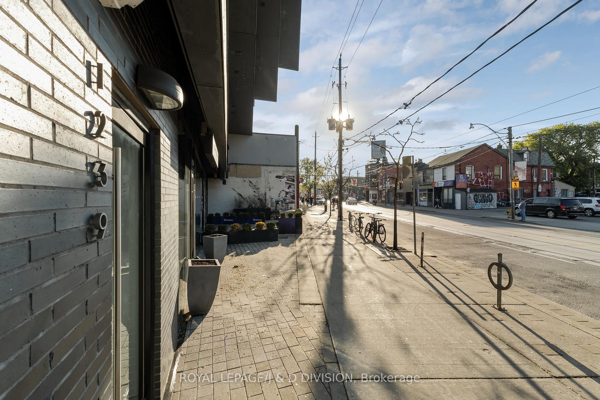 Wide sidewalk in front of building