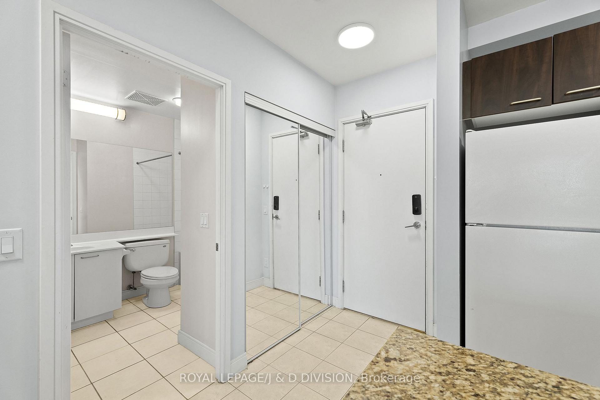 Double Mirrored closets at entrance