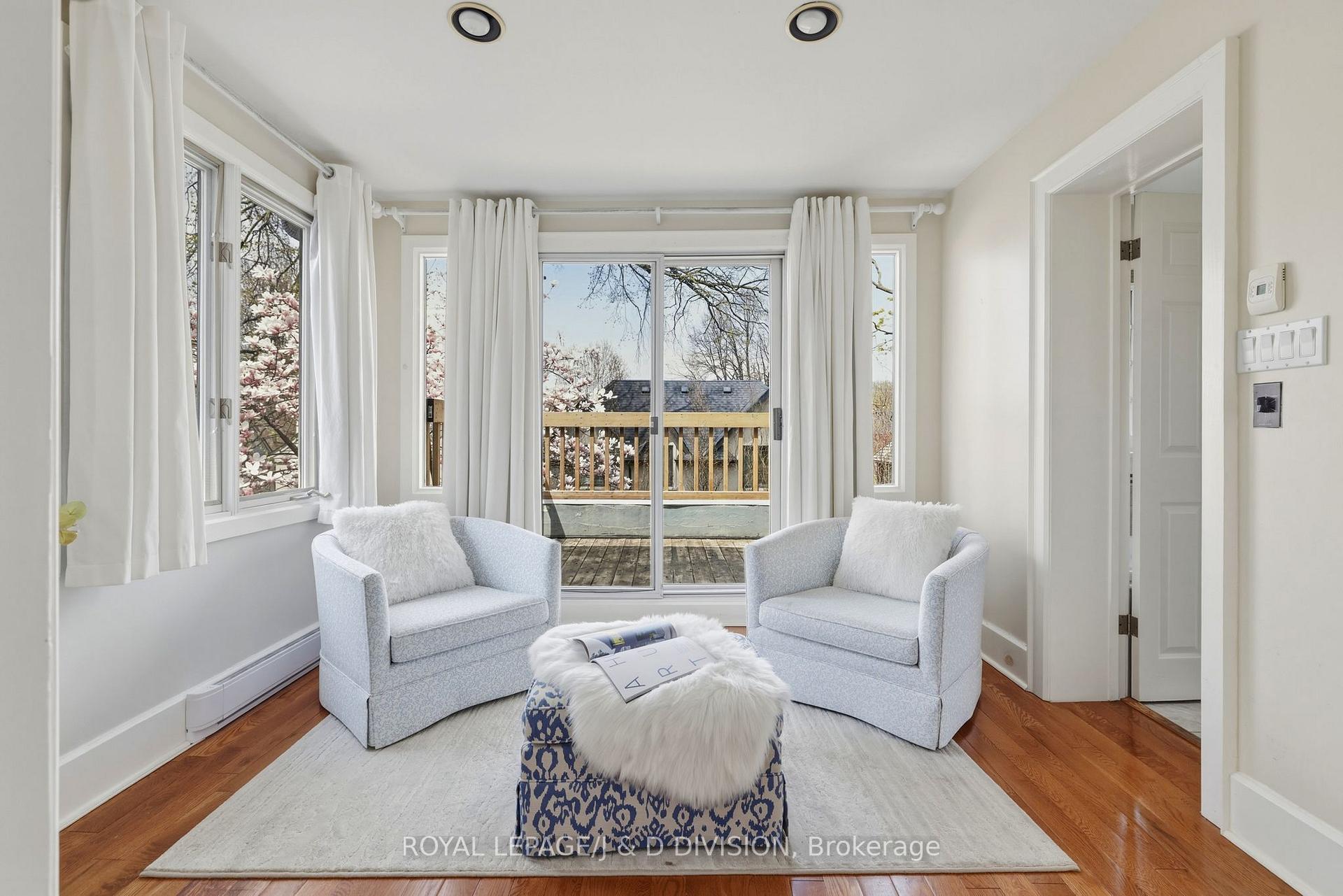 Primary Sitting Room w Walk-out to Balcony