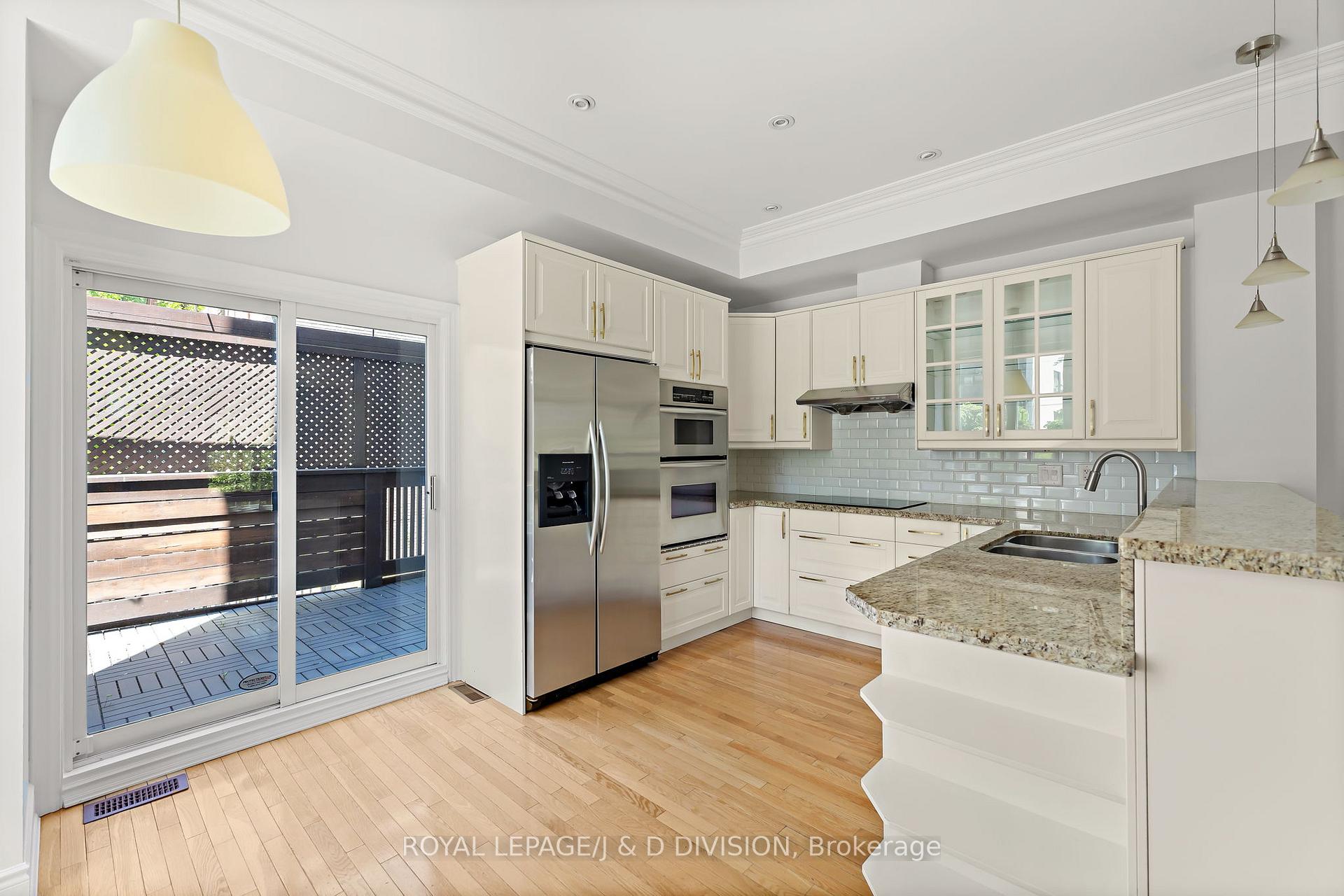 Kitchen w walkout to Deck