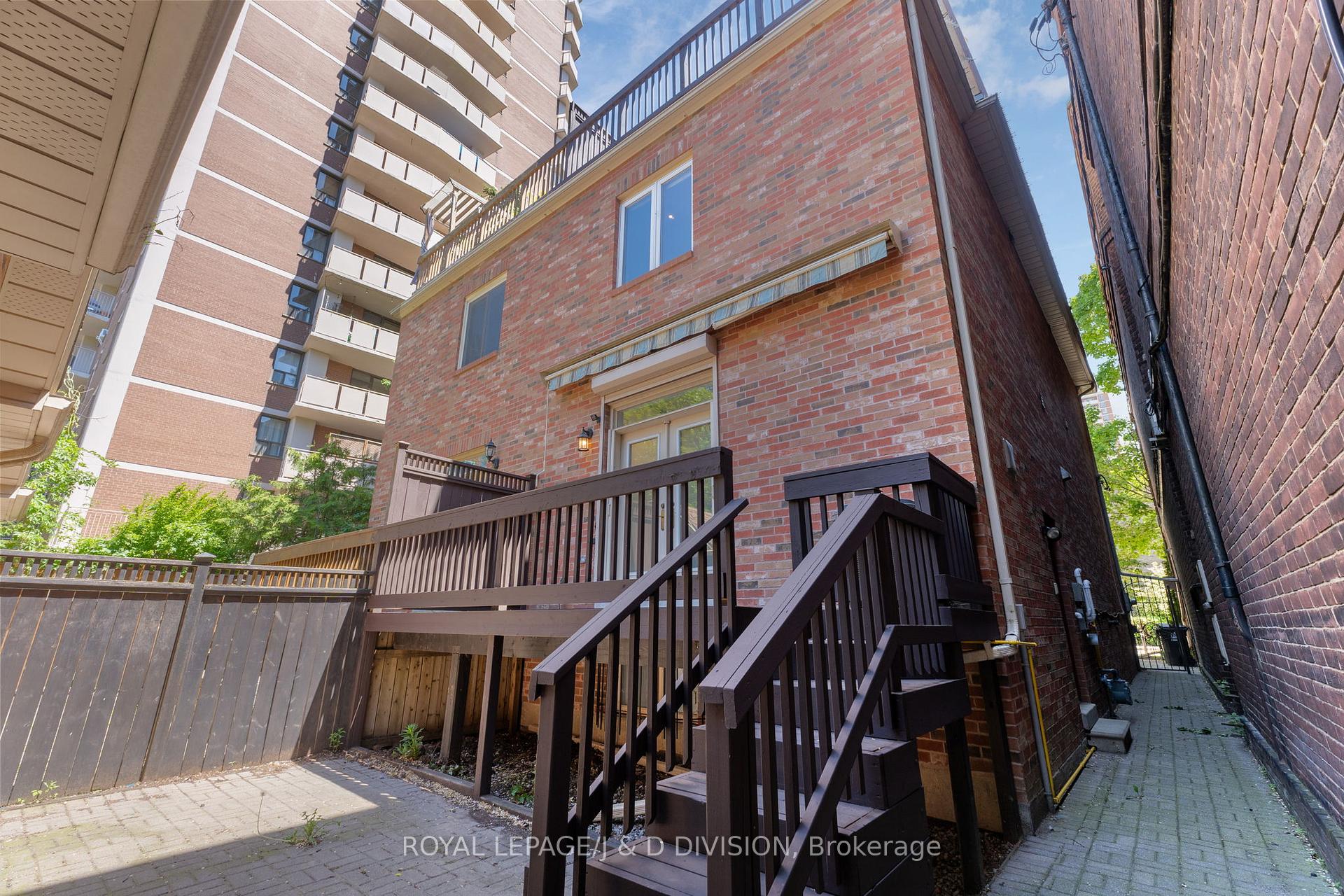 Deck with stairs to lower patio