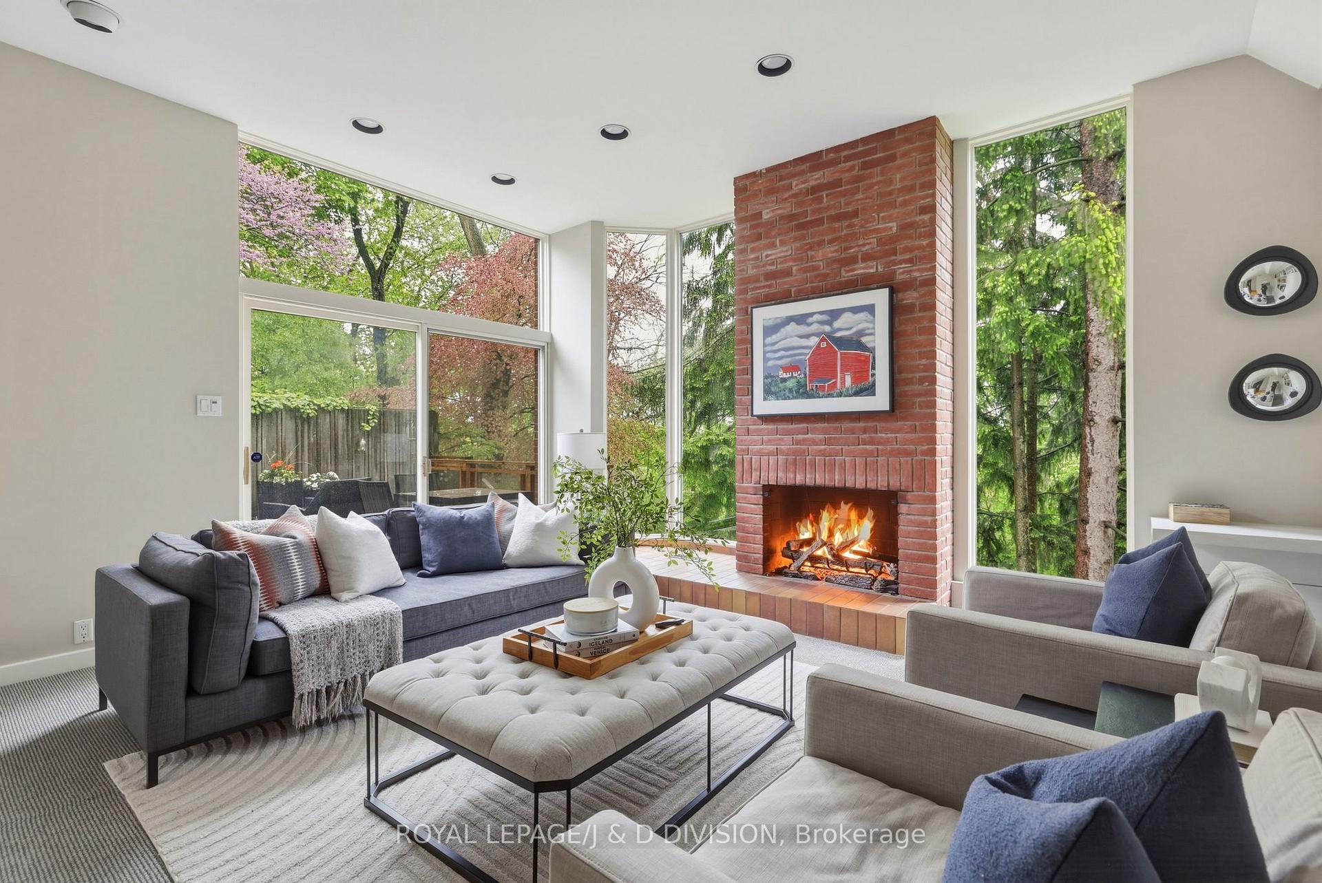Family Room w Gas Fireplace and ravine views