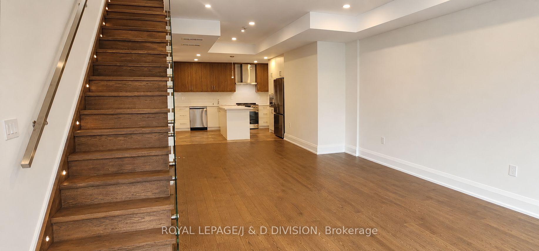 Stairs to Third & Adjacent Open Concept Area