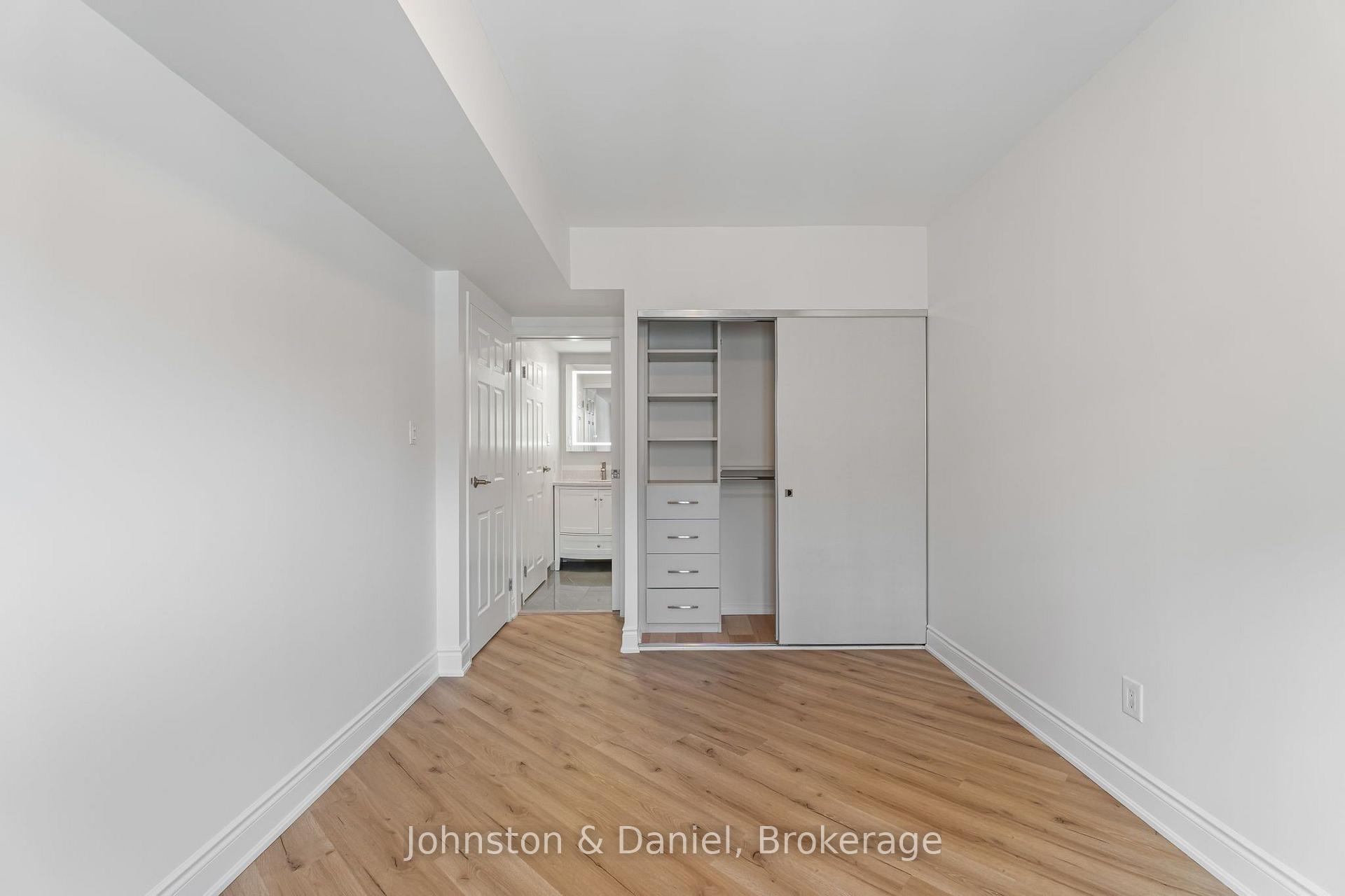 Primary Bedroom looking to 4 pc Ensuite and storag