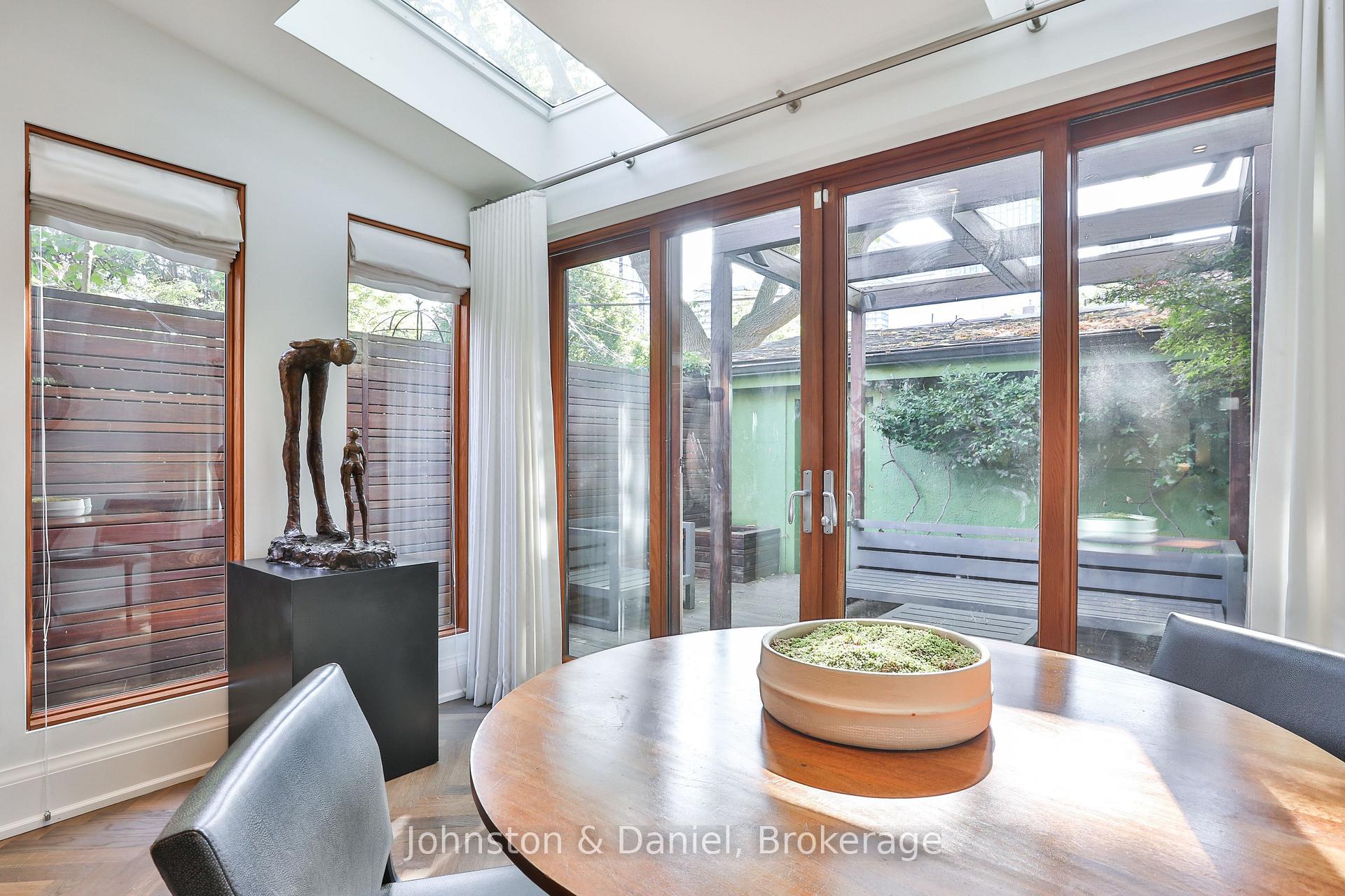 Sun-filled windows & skylights overlooking garden
