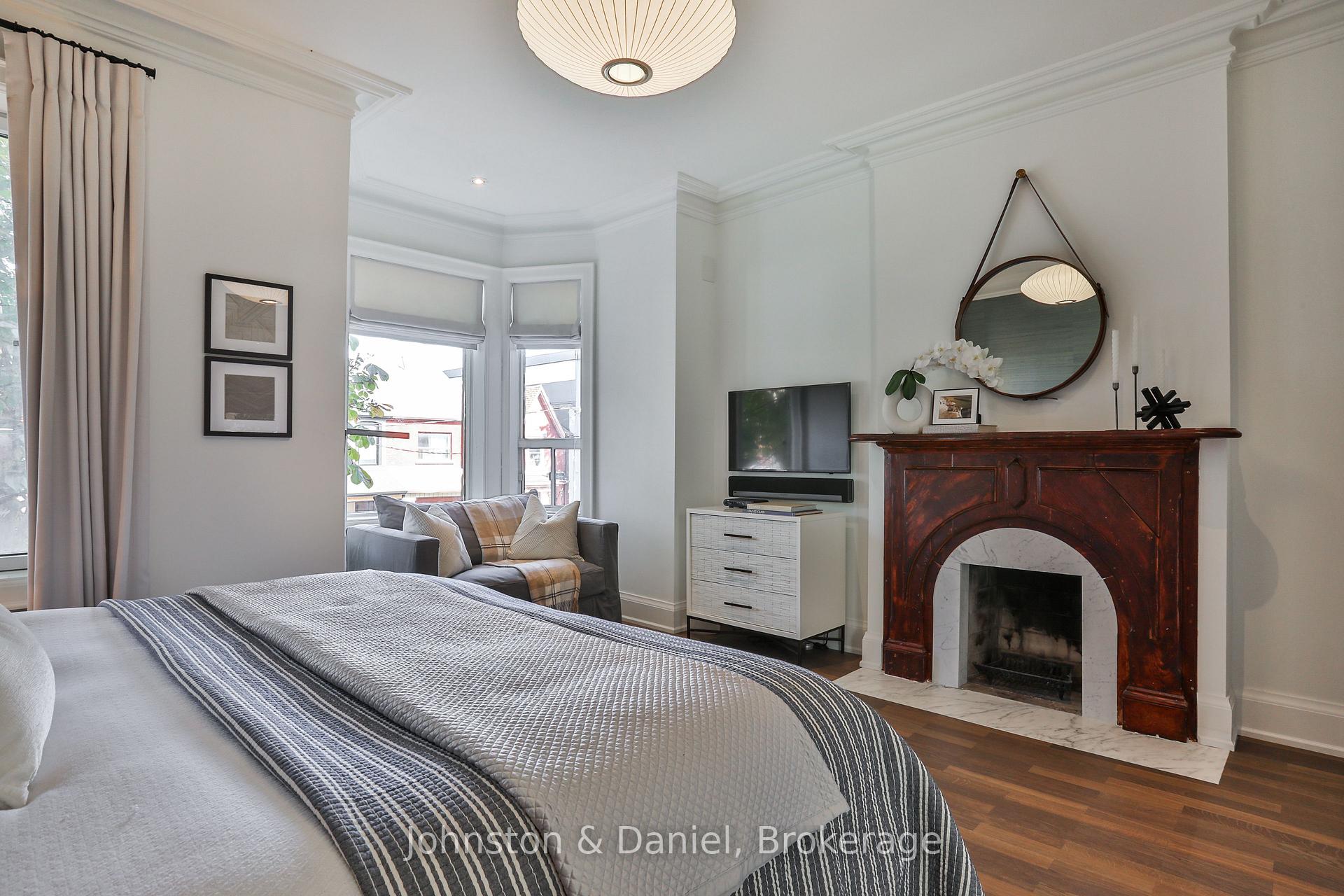 Bedroom #3 fireplace and bay window seating area