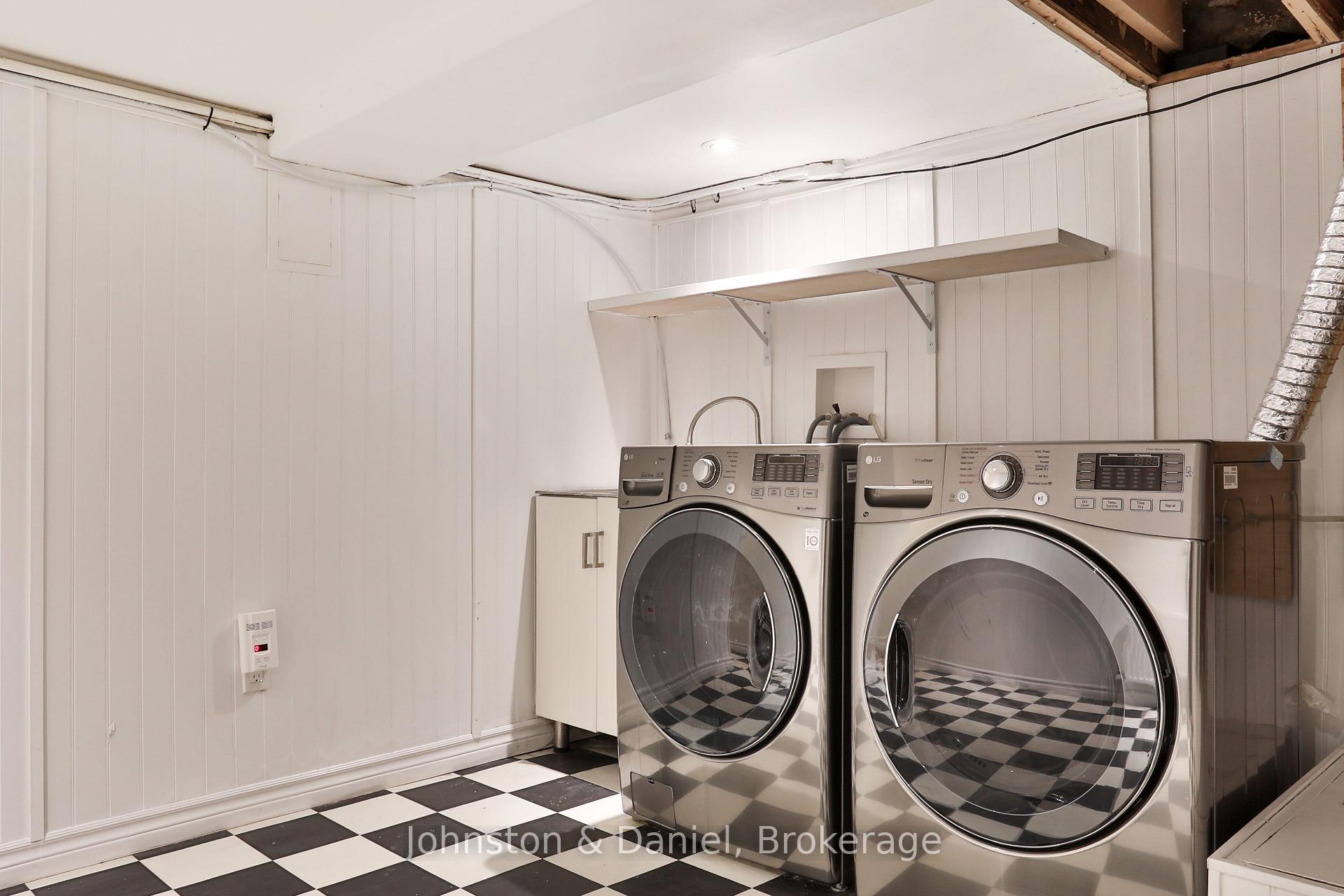Laundry with full size appliances & mechanicals