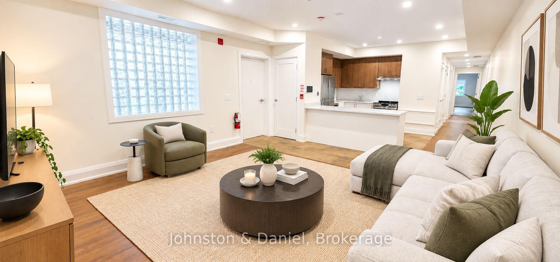 Virtually staged family room view towards kitchen