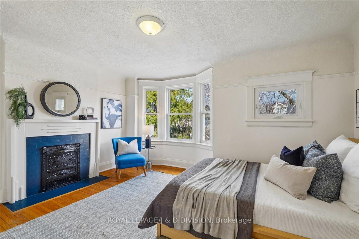 Front bedroom, bay window, hardwood floor