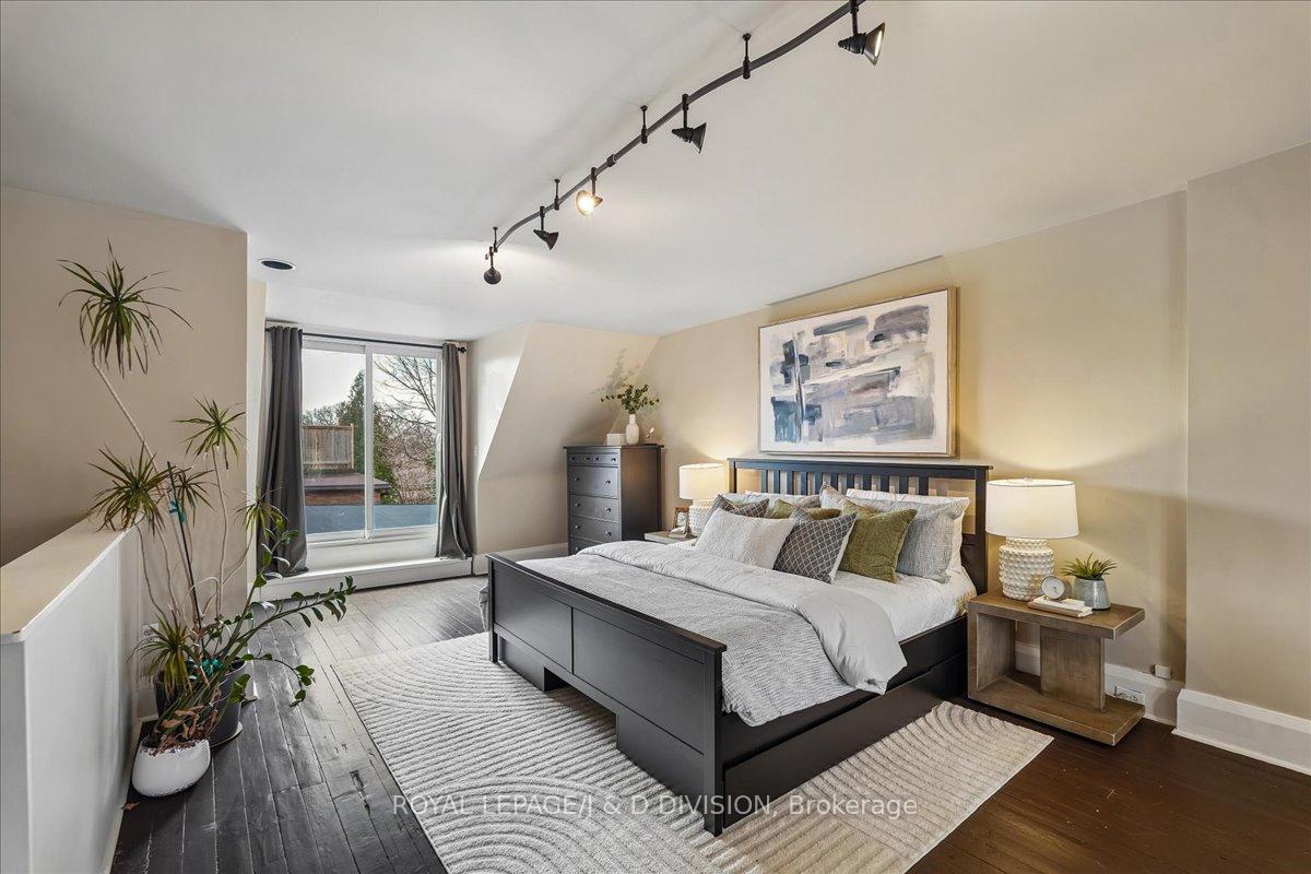 Spacious third floor primary, track lighting