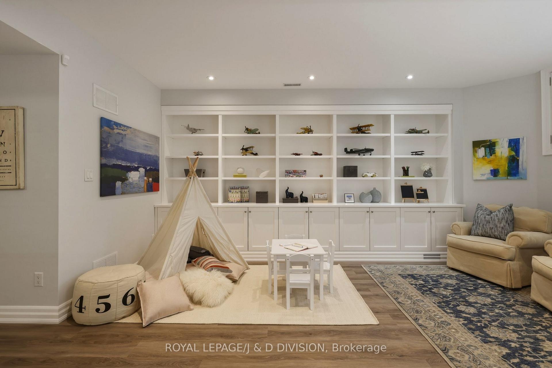 Playroom w Custom Built Shelving