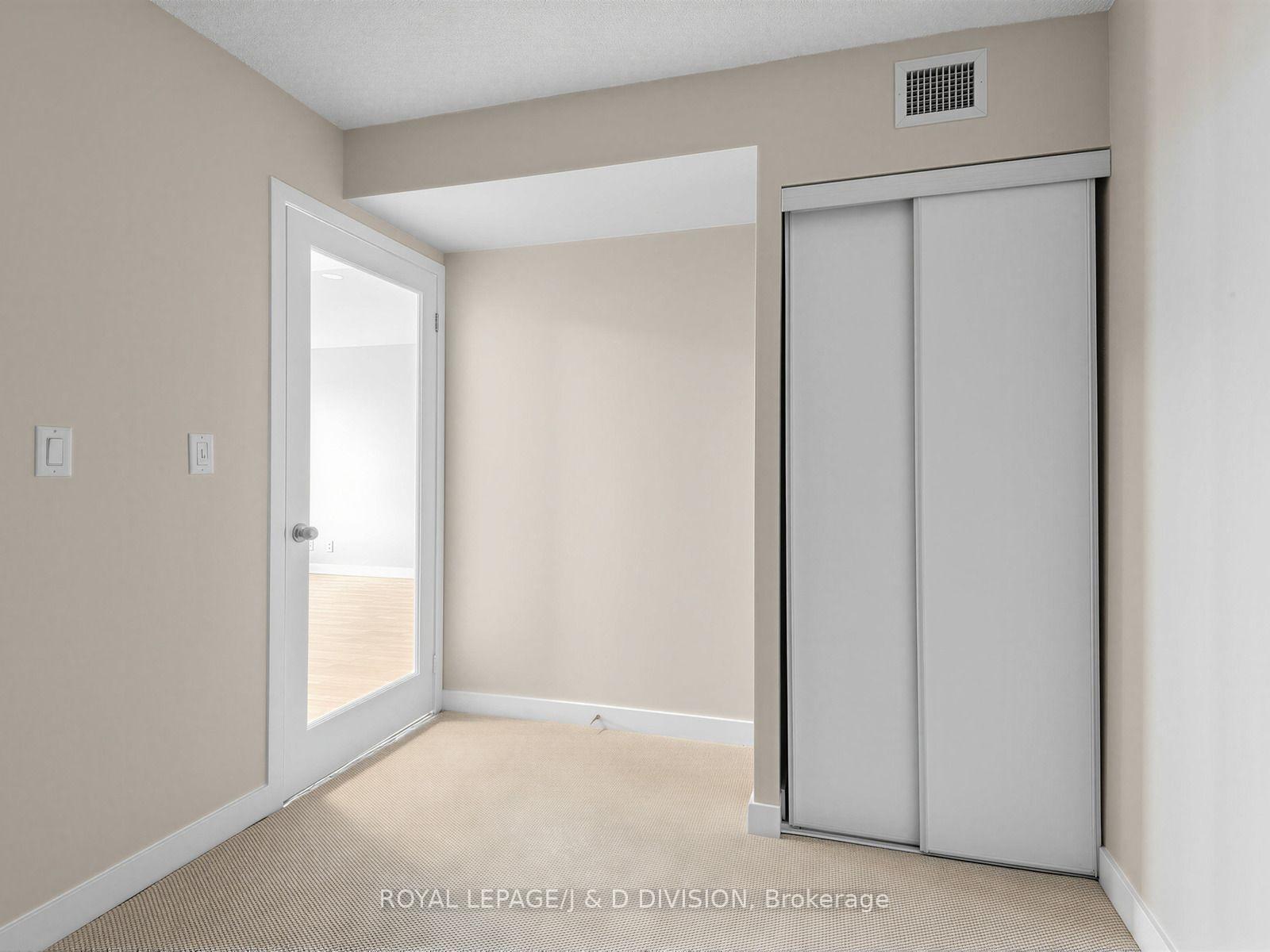 Den with door and closet new carpet and paint