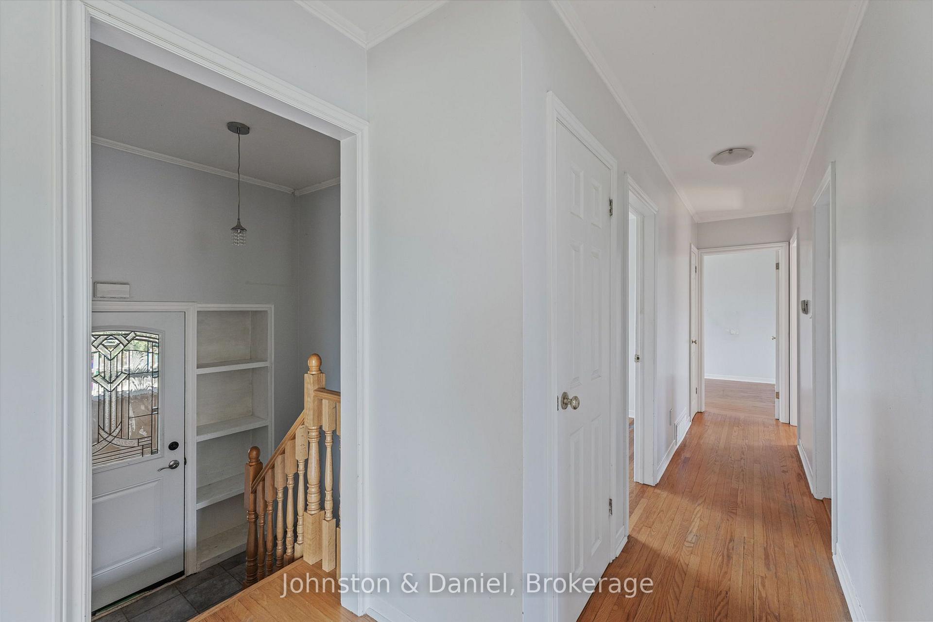 Stairs to entrance and lower level / upper hallway