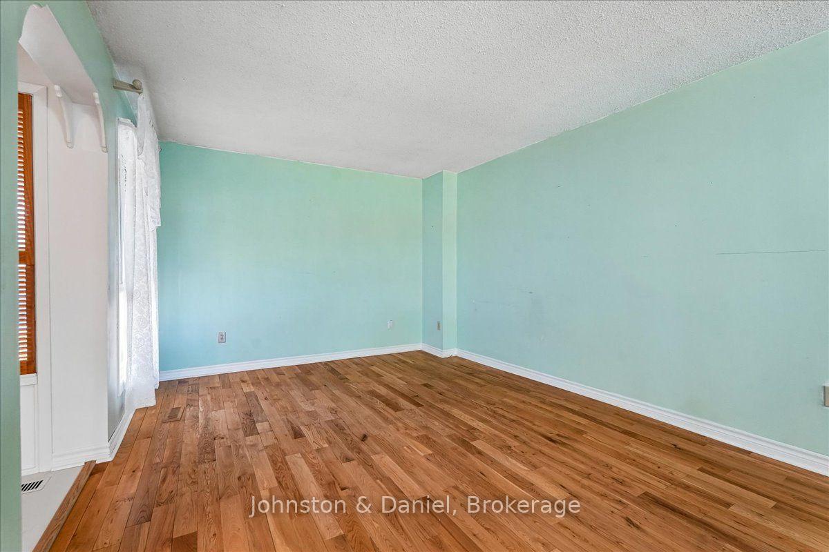 Living room, side window, hardwood floors