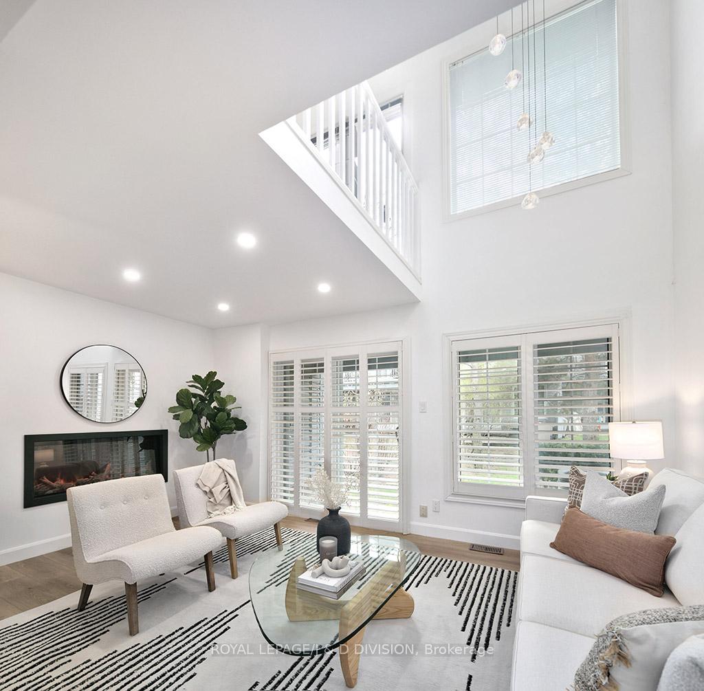 Electric Fireplace / Open ceiling in Living Room