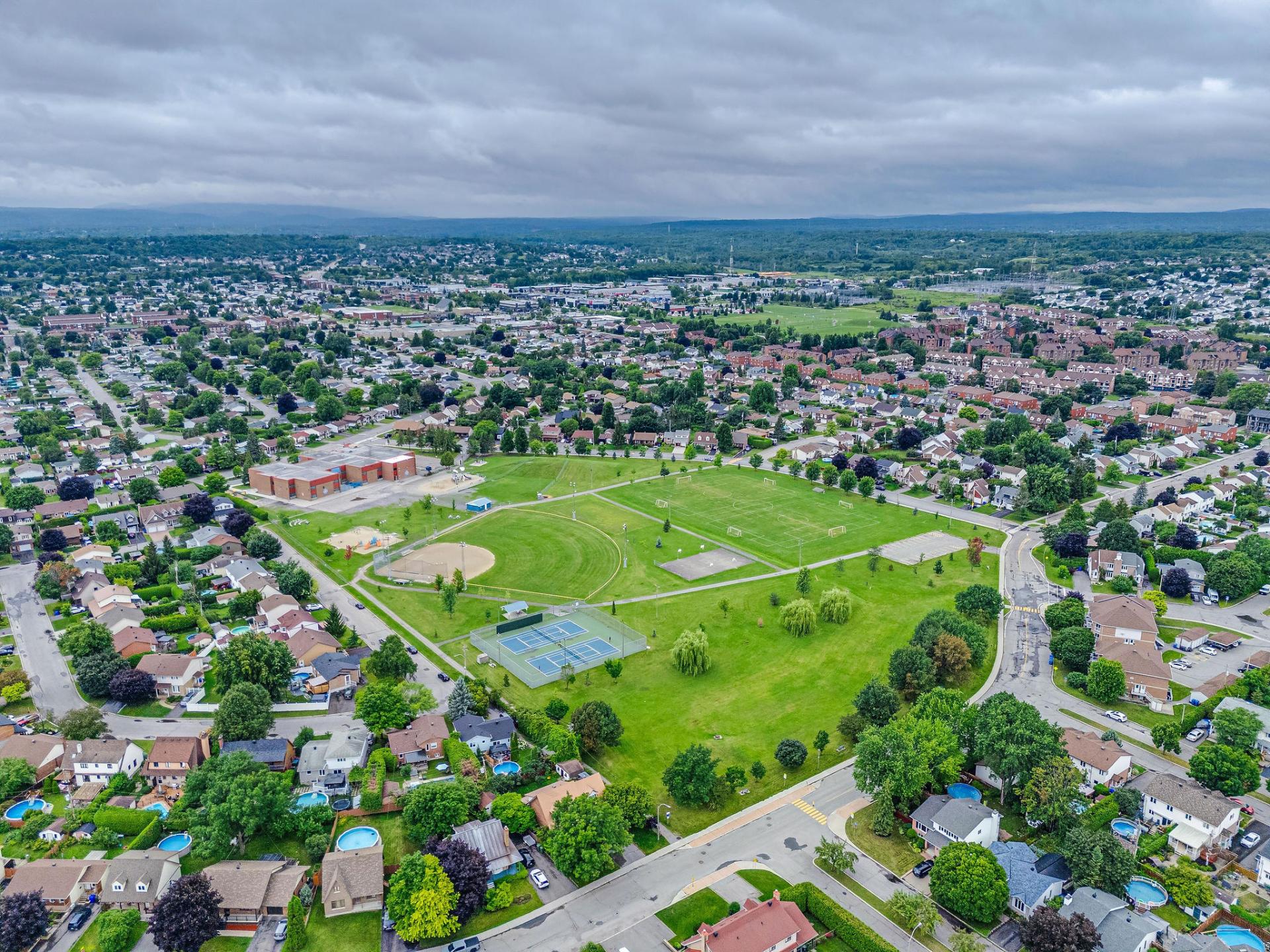 Aerial view of the neighborhood and surroundings