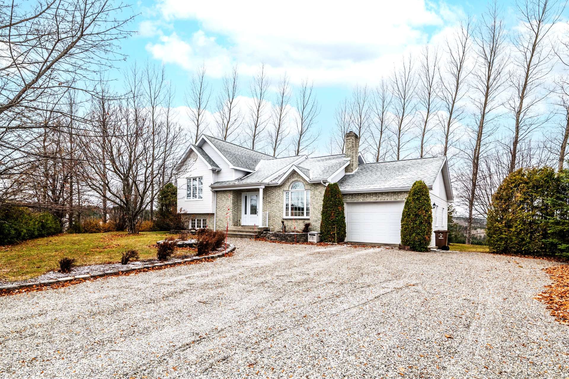 Garage attaché - brique et cannexel