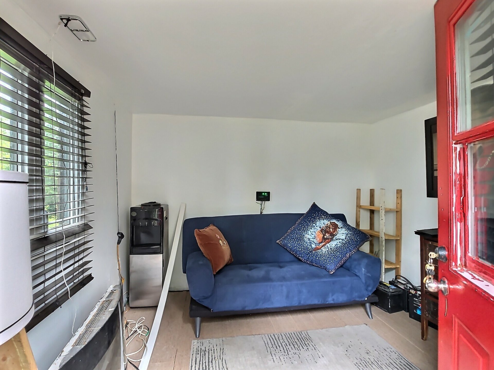 pièce polyvalente chauffée au-dessus de l'atelier