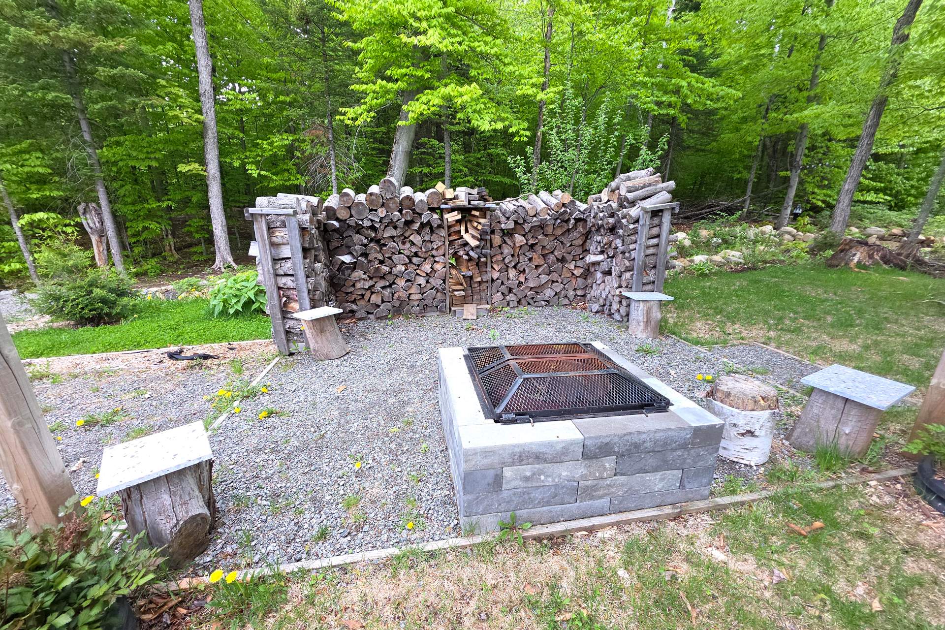 Outdoor fire pit area with wood included