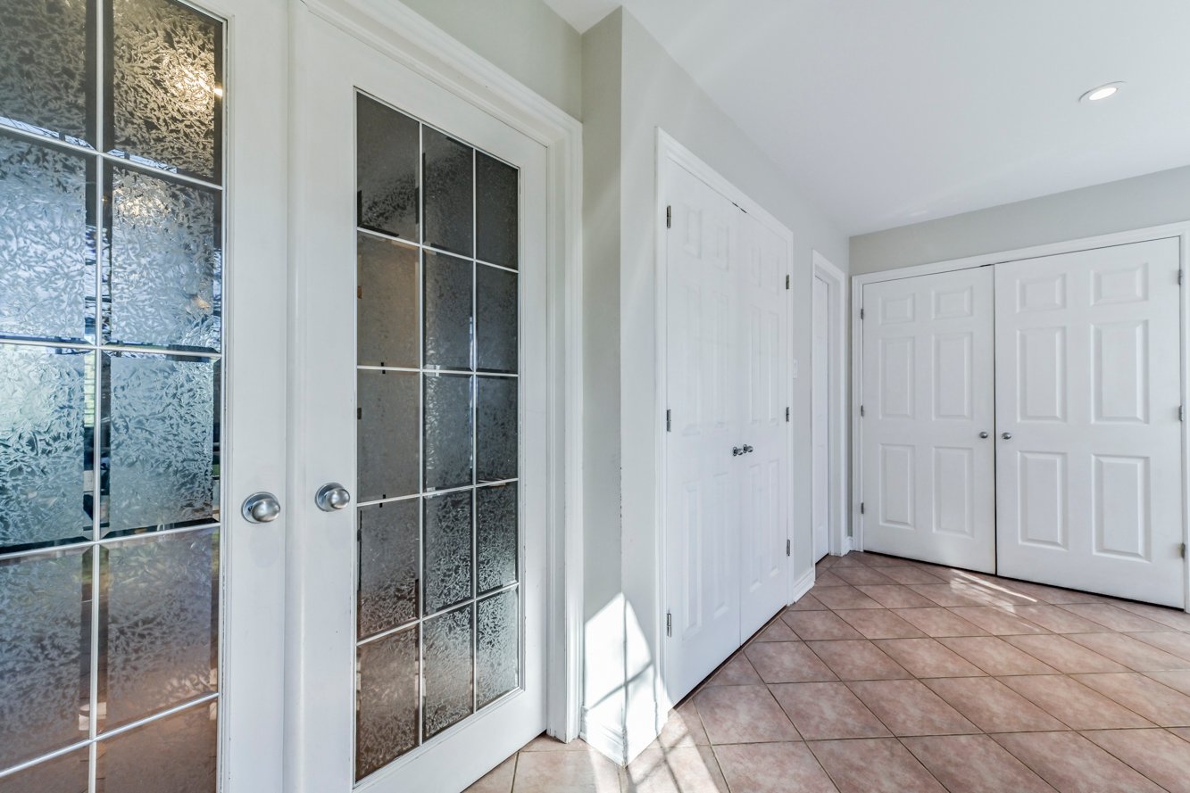 Portes françaises + porte vers la salle de bain